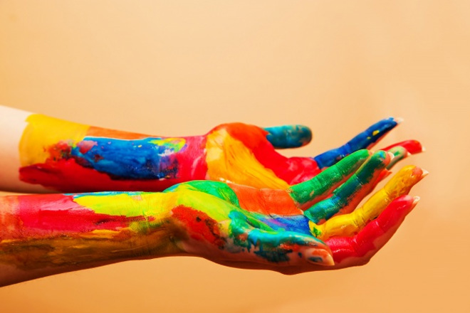 hands painted with color