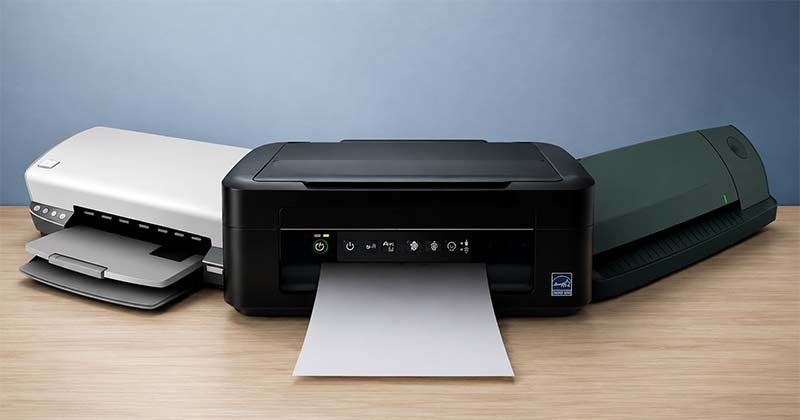 Three modern printers in clean display