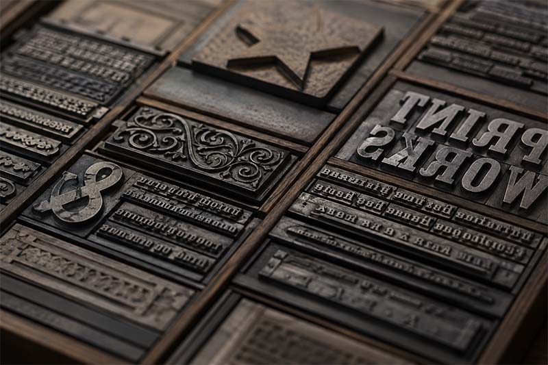Vintage letterpress printing blocks arrangement